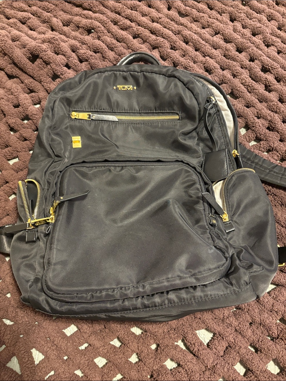 Tumi Black Nylon Backpack with Gold Hardware Accents